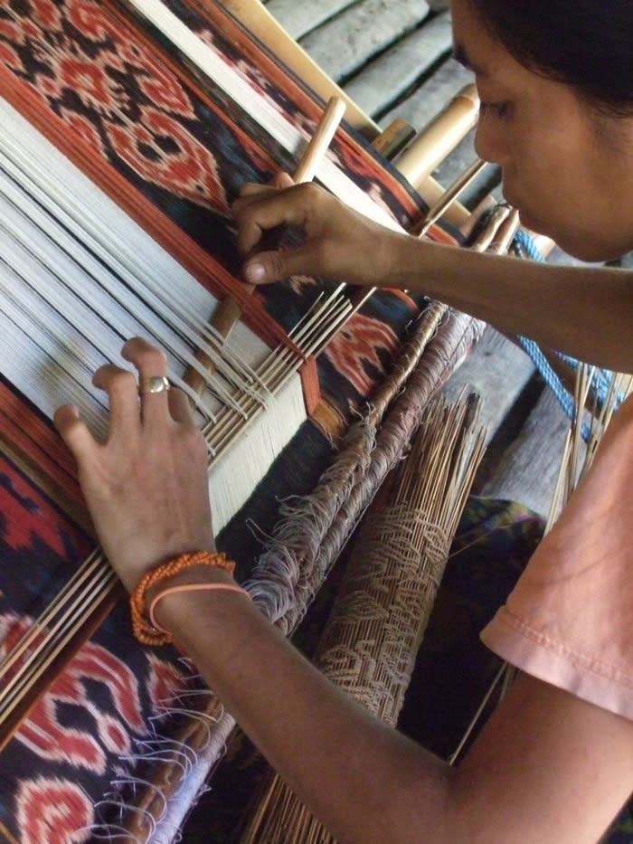 Lining up: A Sumbanese weaver works on a supplementary pattern. (