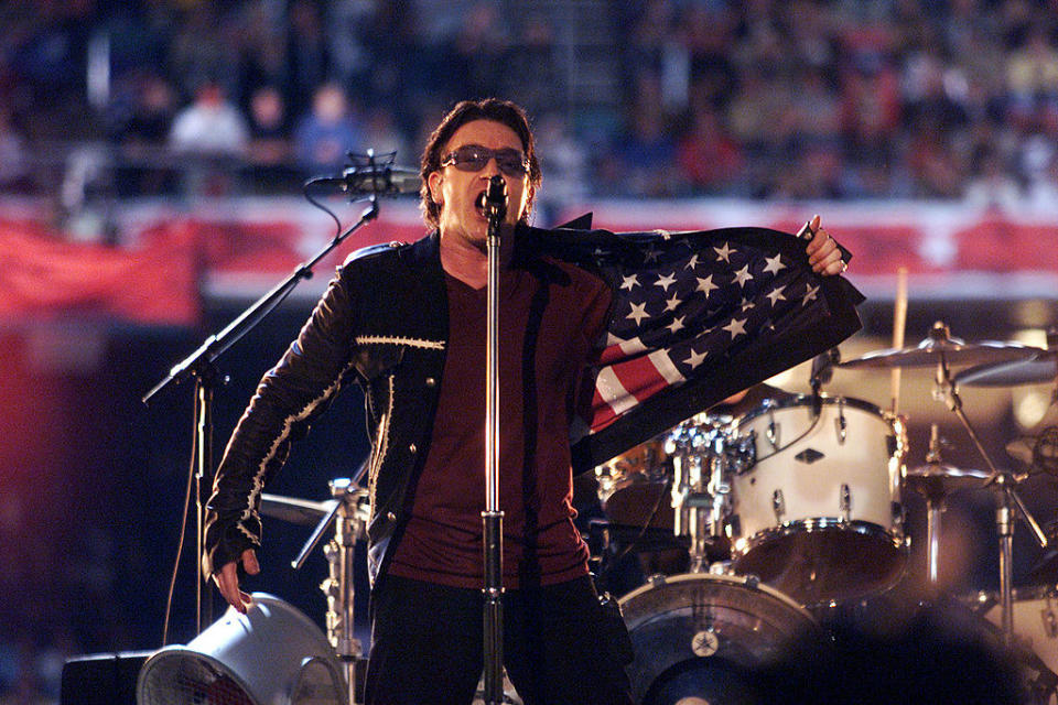 Bono showing the American flag design inside his jacket