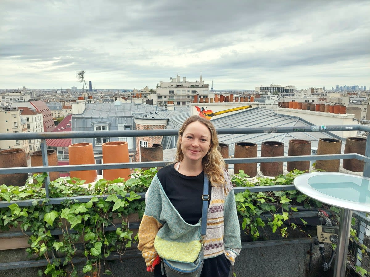 Anna and a view of Paris from the hostel (supplied)
