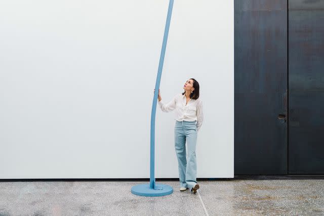 <p>Thomas Gravanis</p> The Breeder Gallery's Alkistis Tsampouraki with a salvaged-steel piece by the artist Philippe Malouin.