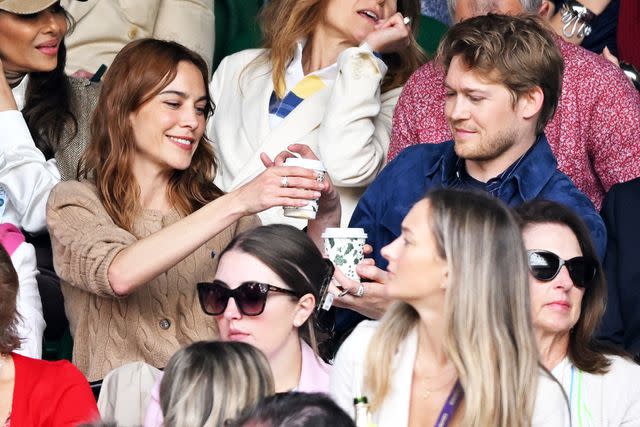 <p>Karwai Tang/WireImage</p> Alexa Chung and Joe Alwyn on July 10, 2024