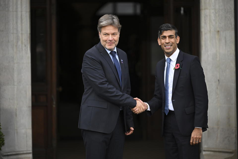 Britain's Prime Minister Rishi Sunak, right, greets Germany's Economy and Climate Action Minister Robert Habeck on the second day of the UK Artificial Intelligence (AI) Safety Summit, at Bletchley Park, in Bletchley, England, Thursday, Nov. 2, 2023. U.S. Vice President Kamala Harris and British Prime Minister Rishi Sunak joined delegates Thursday at a U.K. summit focused on containing risks from rapid advances in cutting edge artificial intelligence. (Leon Neal/Pool Photo via AP)