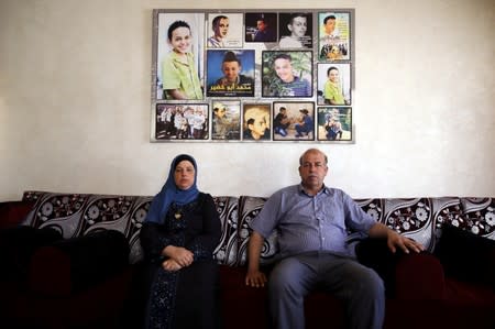 Hussein and Suha Abu Khdeir, whose son's murder is the subject of the HBO series "Our Boys", are seen during an interview with Reuters in their East Jerusalem home