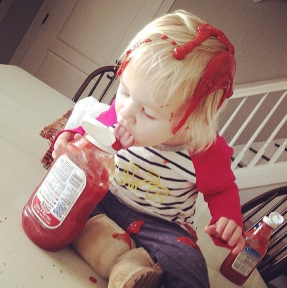 She sure loves ketchup