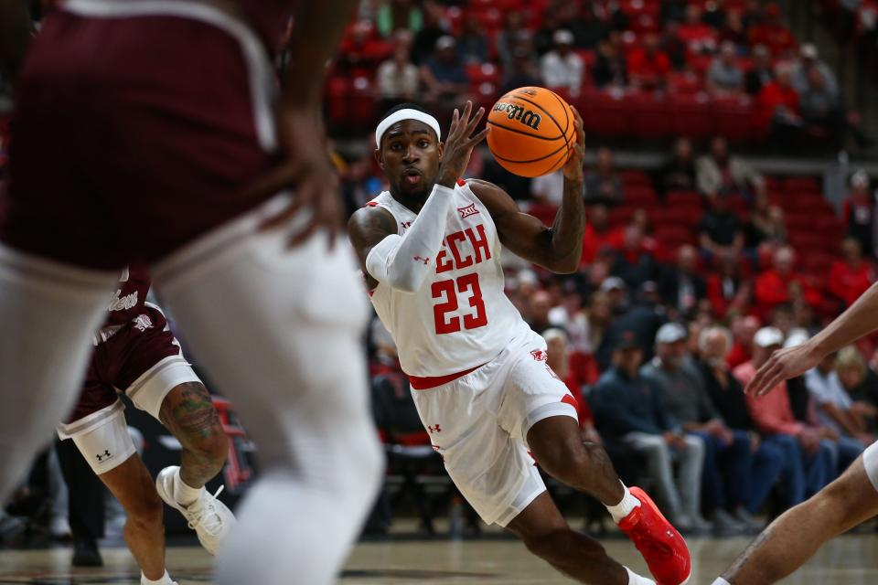 Nov 10, 2022; Lubbock, Texas, USA; Texas Tech Red Raiders De’Vion Harmon (23) grabs a loose ball against the Texas Southern Tigers in the first half at United Supermarkets Arena. Mandatory Credit: Michael C. Johnson-USA TODAY Sports ORG XMIT: IMAGN-500551 ORIG FILE ID:  20221110_ojr_aj7_156.JPG