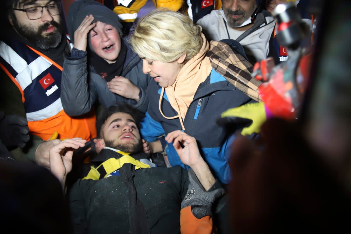 Adnan Muhammed Korkut and his mother (IHA/AP)