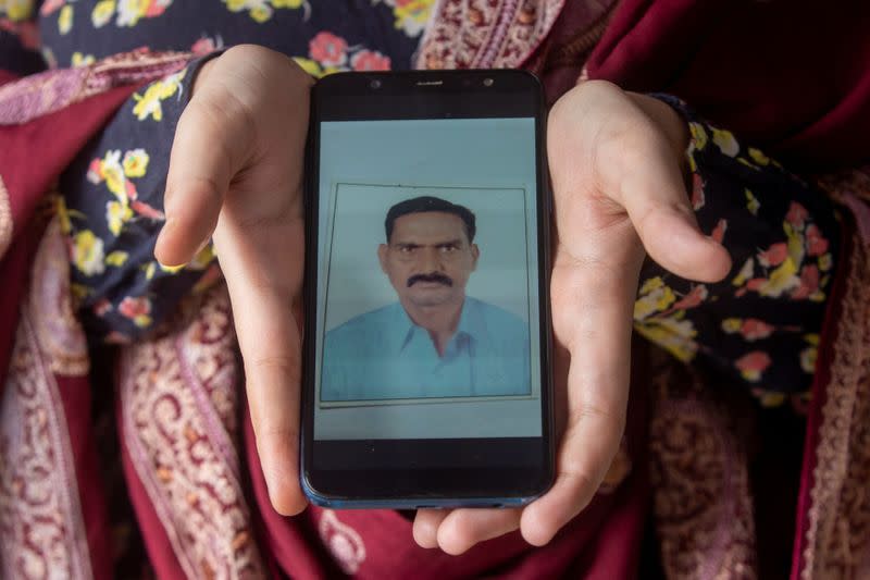 The Wider Image: Indians share the stories of loved ones they lost to the pandemic