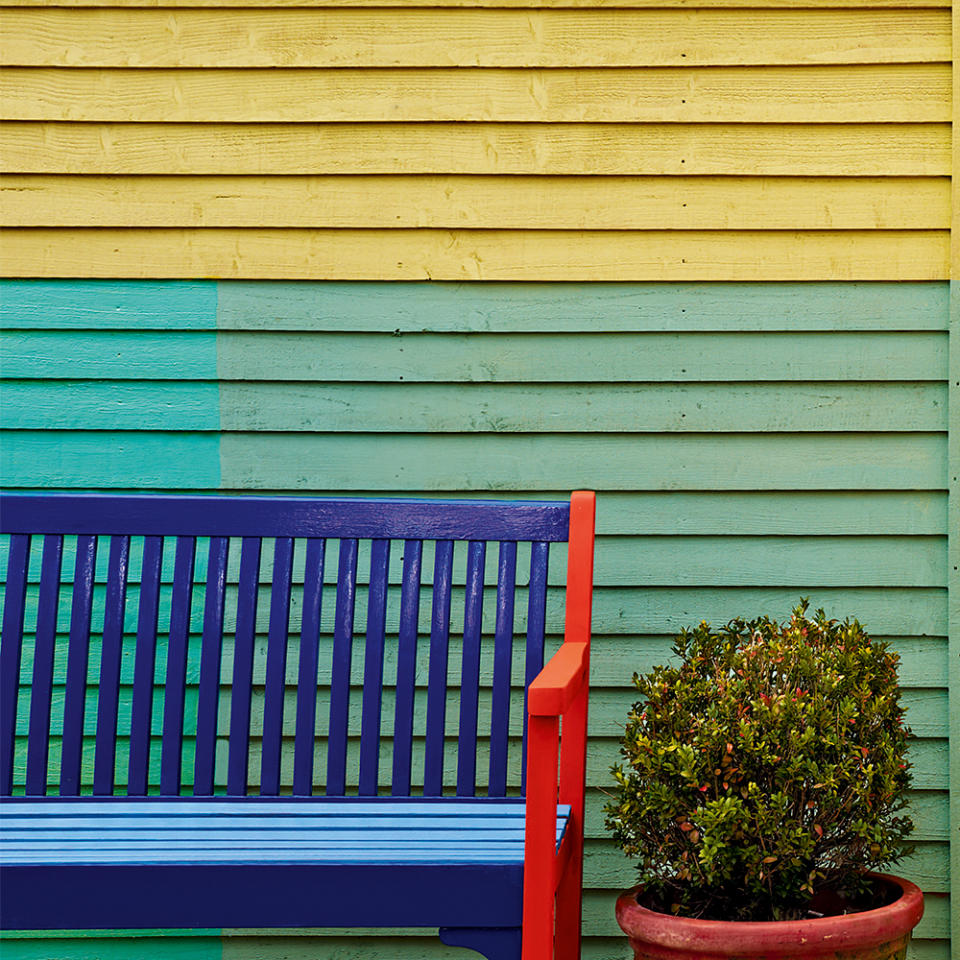 Paint your garden fence to make it colourful and cheery
