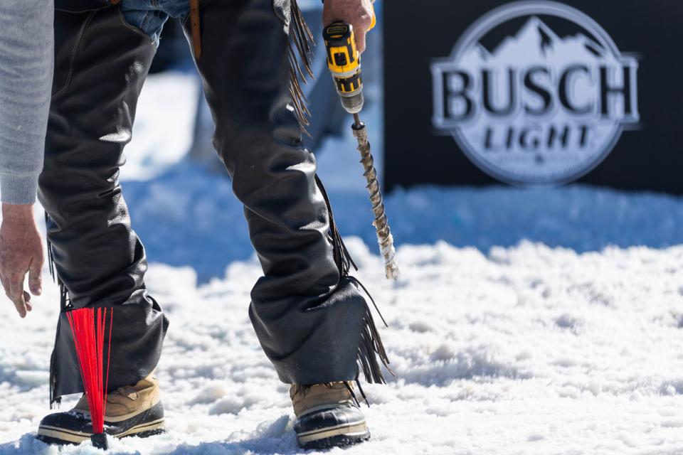 A marker is placed in the skijoring course at the Wasatch County Event Complex in Heber City on Saturday, Feb. 17, 2024. Snowboarders and skiers are expected to pass through the markers or receive a penalty on their time. | Marielle Scott, Deseret News