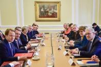 Britain's Prime Minister Theresa May chairs a Joint Ministerial Committee attended by Scotland's First Minister Nicola Sturgeon (3rd R) and Wales' First Minister Carwyn Jones (5th R) at Cardiff City Hall, Wales, January 30, 2017. REUTERS/Ben Birchall/Pool