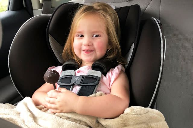 <p>Amelia Zamora</p> Zamora's daughter celebrating with a cake pop after getting her cast off.