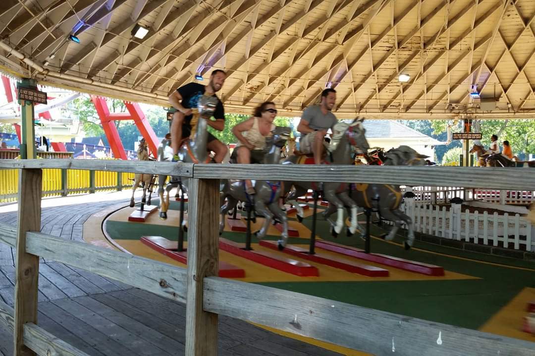 Derek, Doug and their mom Marie Perry took a spin on Derby Racer at Playland Park.
