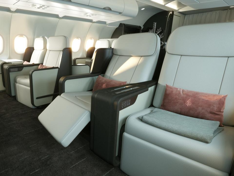Inside the private jet with seating areas.