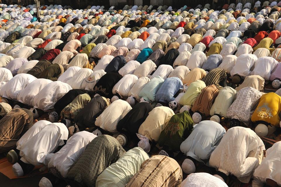 Muslims pray to mark Eid al-Adha on street in Mumbai Muslims pray to mark Eid al-Adha on a street in Mumbai Muslims around the world are celebrating Eid-al-Adha, marking the end of the haj, by slaughtering sheep, goats, cows and camels to commemorate Prophet Abraham's willingness to sacrifice his son Ismail on God's command