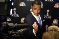 FILE PHOTO: Jan 27, 2015; Phoenix, AZ, USA; NBC Sports analyst Rodney Harrison shows reporters his Super Bowl ring during the NBC Sports Group Press Conference at Media Center-Press Conference Room B. Mandatory Credit: Peter Casey-USA TODAY Sports