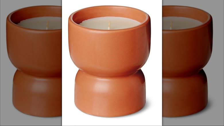 Candle in terracotta holder