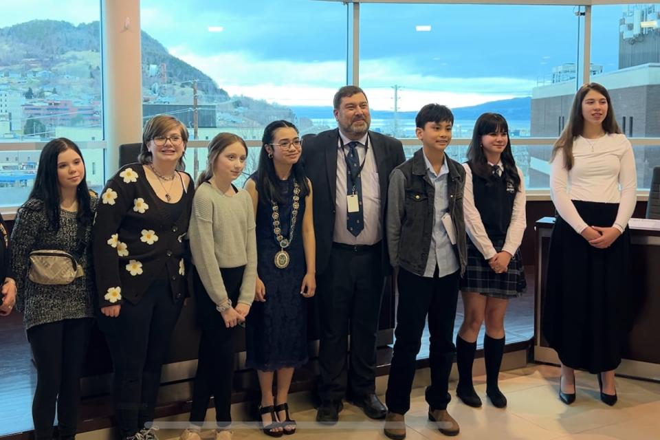 From left: Grade 6 students Jacey Donovan, Harper Lovell, Jae-Anna Watkins, Kenna Mangosing, Corner Brook Mayor Jim Parsons, Waelan Aguilar, Abigail Benoite and Madeline Targett made up the Corner Brook youth council on Monday, hosting a mock city council meeting to learn about municipal government.