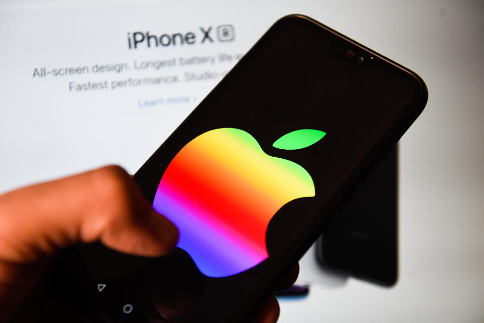 POLAND - 2019/06/09: In this photo illustration an Apple logo with rainbow colors seen displayed on a smart phone. (Photo Illustration by Omar Marques/SOPA Images/LightRocket via Getty Images)