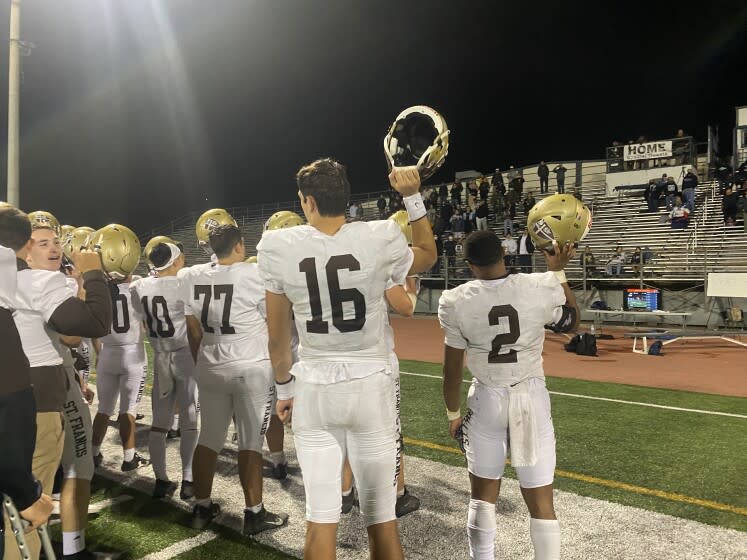 Quarterback Jack Jacobs (16) and running back Max Garrison (2) benefit from St. Francis offensive line.