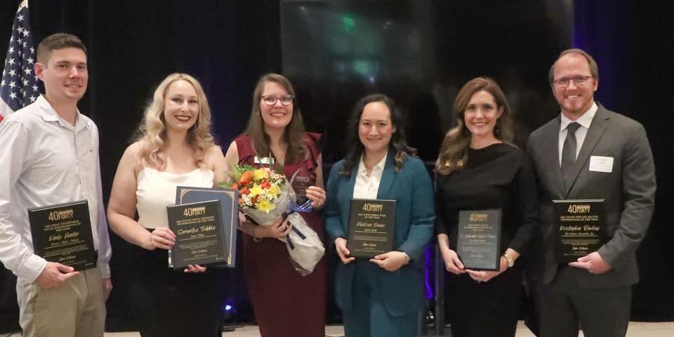 This year's Volusia-Flagler area "Young Professional of the Year" Sarah-Jane Griffin, third from the left, stands alongside the five other special award winners at the "40 Under Forty" event at the Cici & Hyatt Brown Museum of Art in Daytona Beach on Thursday. Pictured, starting from the left: Wade Hunter (Most Charitable), Samantha Tribble (Small Business), Griffin, Khelsea Bauer-Young (Rising Star), The Honorable Rachel Myers (Local Government), Kristopher Rowley (Private Sector).