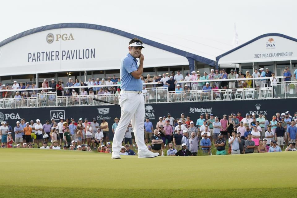 Louis Oosthuizen, of South Africa, works on the 18th green during the third round at the PGA Championship golf tournament on the Ocean Course, Saturday, May 22, 2021, in Kiawah Island, S.C. (AP Photo/Matt York)