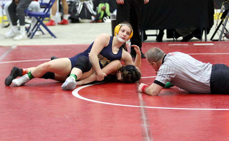 Tioga Central's Emily Sindoni, top, won the girls 126-pound title with a pin of Athens' Hannah Rathbun as Elmira's First Arena hosted the Southern Tier Classic wrestling tournament Jan. 14, 2022.