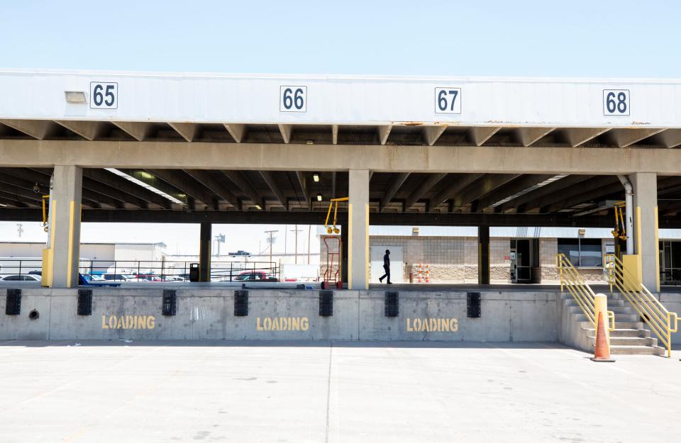 An inspection zone for commercial transport is photographed at the Bridge of the Americas port of entry. The 50-year-old land port of entry administrative building shows signs of age in its infrastructure.