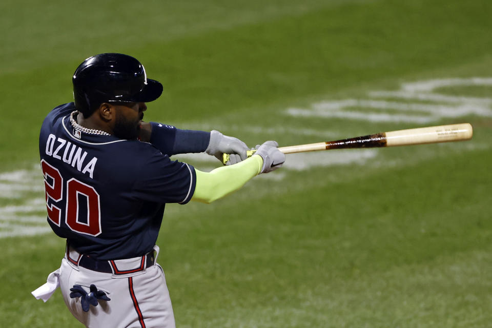 Atlanta Braves designated hitter Marcell Ozuna hits a three-run home run during the second inning of a baseball game against the New York Mets, Friday, Sept. 18, 2020, in New York. (AP Photo/Adam Hunger)