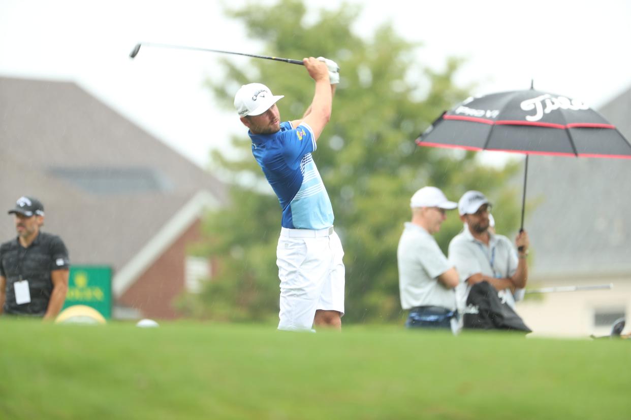 Canadian professional golfer Adam Svensson practices his swing before competing in the FedEx St. Jude Championship on August 8, 2023 at TPC Southwind in Memphis, Tenn.