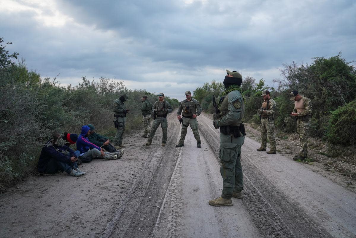 Texas Department of Public Safety special agents oversee a group of four Honduran undocumented migrants that were caught in private property in Kinney County near Brackettville, Texas on Nov. 9, 2021. The owner of the property did not sign the affidavit to allow DPS to arrest undocumented migrants in their property, so they will be processed by Border Patrol.