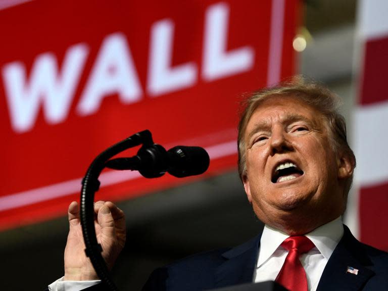 Trump claims Democrat wants to 'execute a baby' then lies about El Paso border wall in wild rally speech