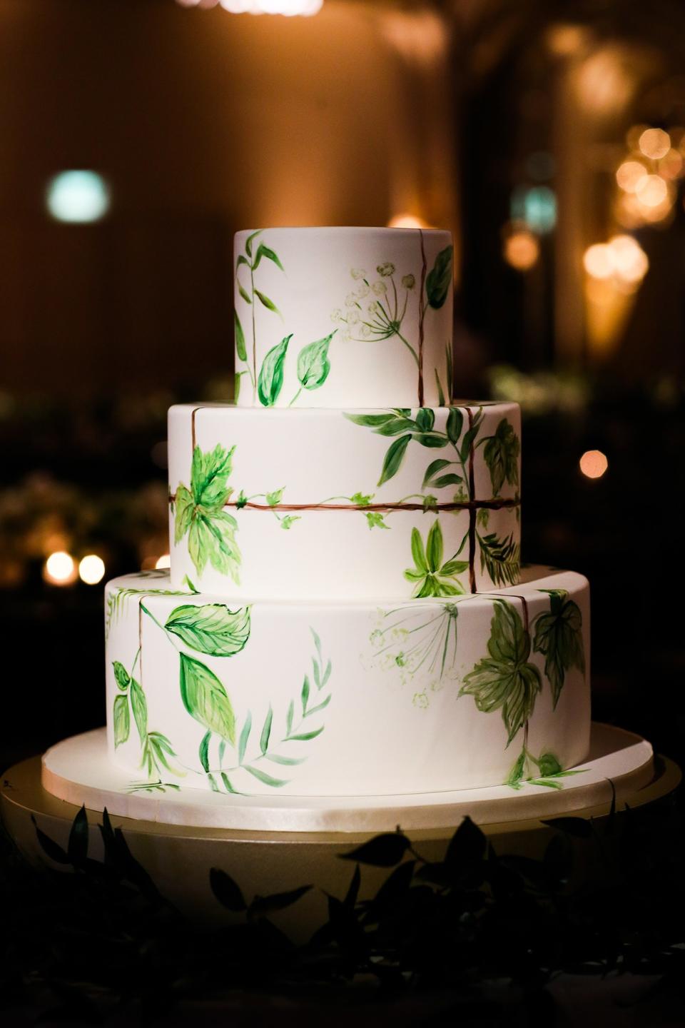 The bride wore Oscar de la Renta, inspired by her grandmother, for her greenery-filled ceremony at the Beverly Hills Hotel.