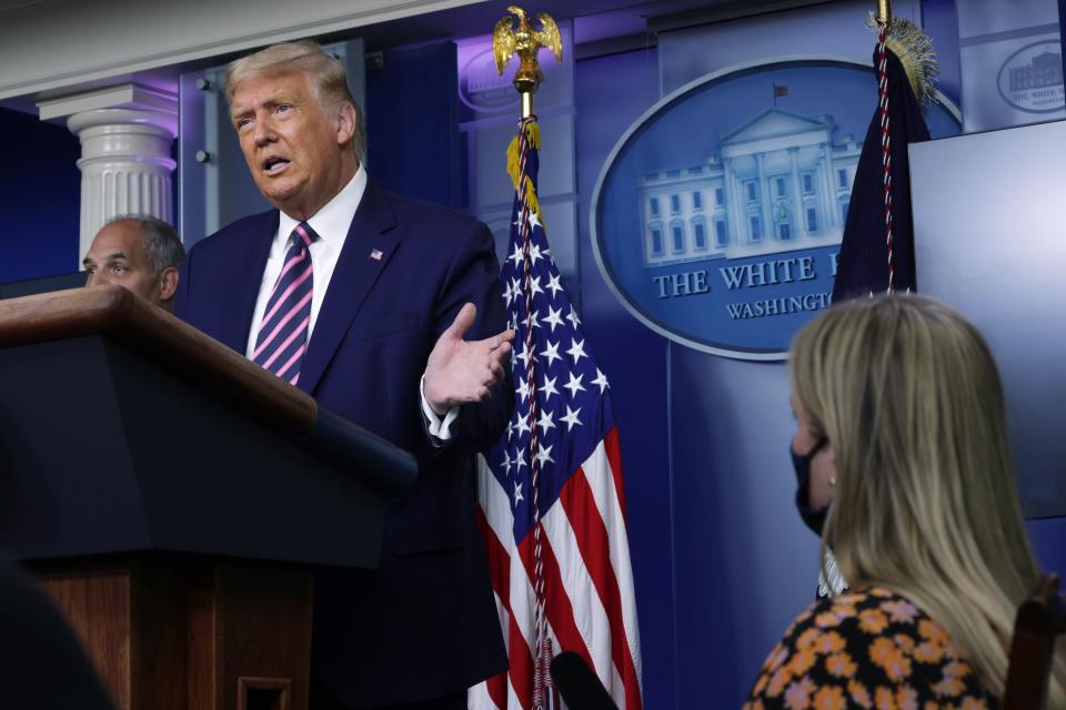 President Donald Trump holds a White House news conference Friday. A new HuffPost/YouGov poll indicates 51% of Americans disapprove of the way the president has handled the coronavirus pandemic. (Alex Wong via Getty Images)