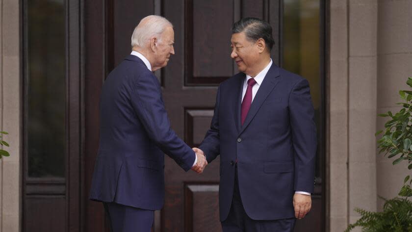 President Joe Biden greets China's President President Xi Jinping at the Filoli Estate in Woodside, Calif., Wednesday, Nov, 15, 2023, on the sidelines of the Asia-Pacific Economic Cooperative conference. (Doug Mills/The New York Times via AP, Pool)