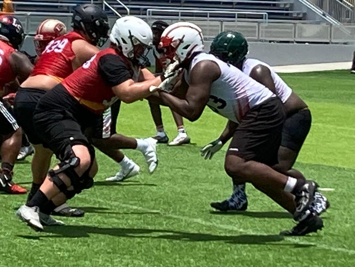 Westside defensive lineman Jordan Hall blocks against Neil Sledge, from Georgia, at Saturday's FBU Top Gun Showcase in Naples.