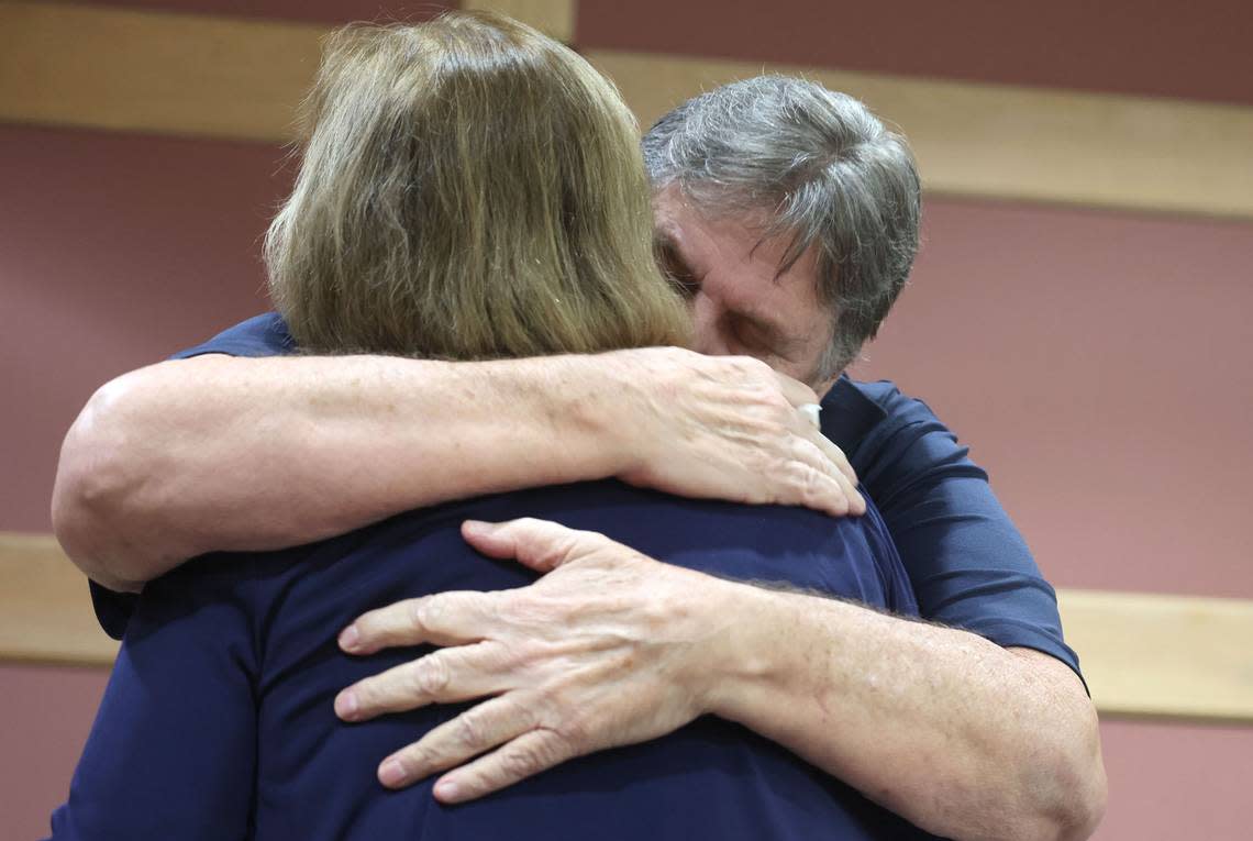 Joe and Rae Dowling comfort each other during a hearing for Terry McKirchy, the babysitter charged with murder for the death of their son Benjamin Dowling after she allegedly permanently injured him by shaking him as a 5-month-old in the 1980s, at the Broward County Courthouse in Fort Lauderdale on Wednesday, Aug. 21, 2024. (Carline Jean/South Florida Sun Sentinel)