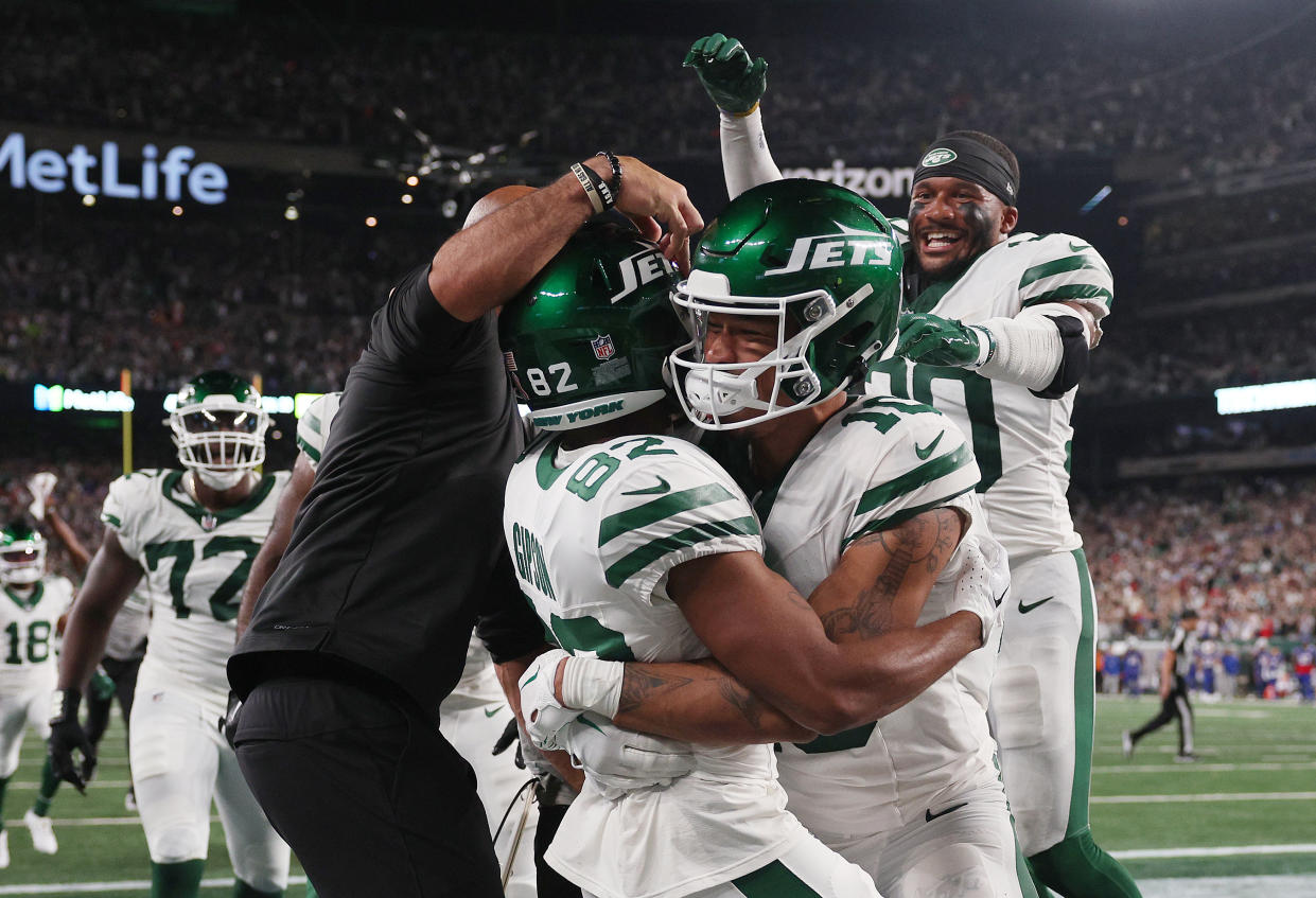 The Jets celebrate the game-winning overtime punt return by rookie Xavier Gipson (82) to beat the Buffalo Bills in the season opener. (Photo by Elsa/Getty Images)