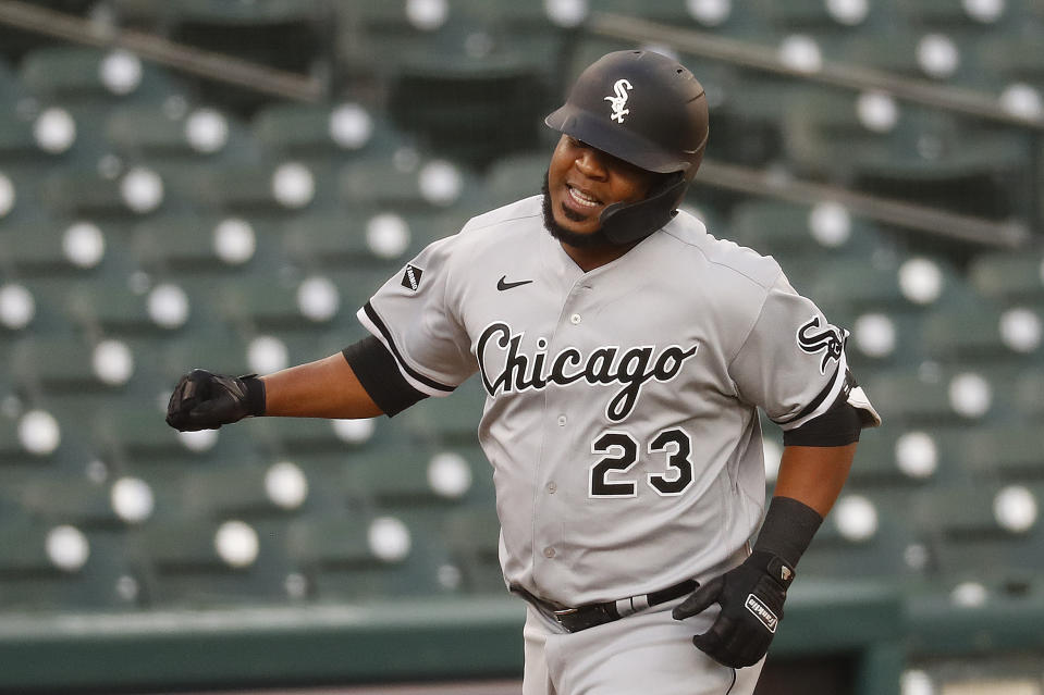 Chicago White Sox's Edwin Encarnacion celebrates his solo home run against the Detroit Tigers in the fourth inning of a baseball game in Detroit, Tuesday, Aug. 11, 2020. (AP Photo/Paul Sancya)