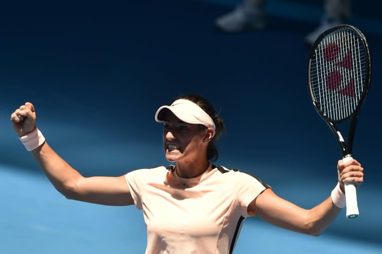 France's Caroline Garcia celebrates after beating Czech Republic's Marketa Vondrousova in their Australian Open second round match, in Melbourne, on January 18, 2018