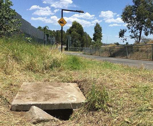 The child was found in this drain at Quakers Hill.