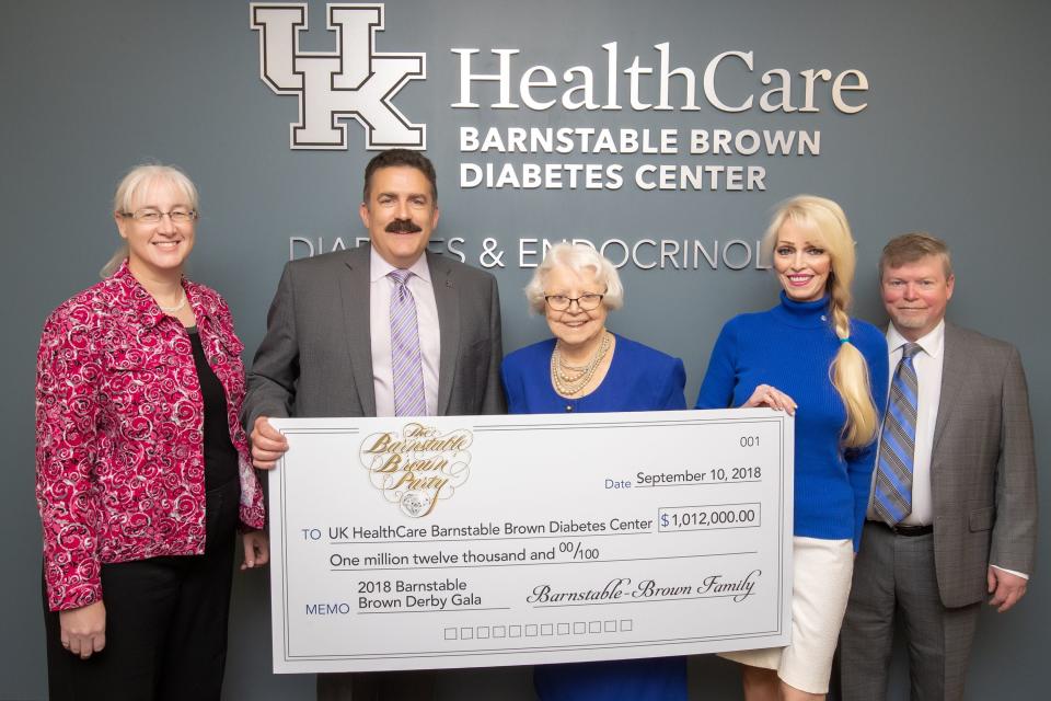 Check presentation to University of Kentucky Health Care Barnstable Brown Diabetes Center. 
Left to Right
Lisa Tannock, MD (Adult Endocrinology Division Chief)
Mark F. Newman, MD (Executive Vice President Health Affairs)
Willie Barnstable
Tricia Barnstable-Brown
John Fowlkes, MD (Director)