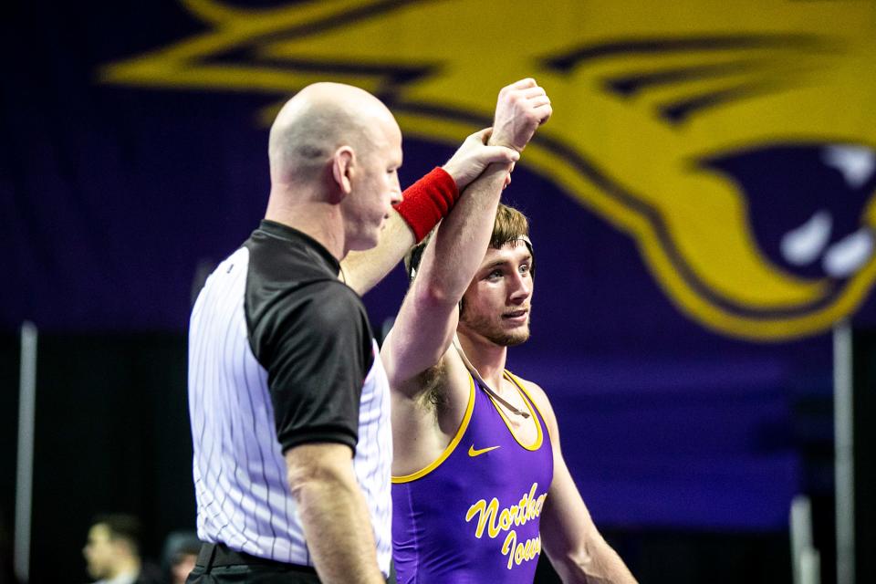 Northern Iowa's Colin Realbuto has his hand raised after scoring a decision at 149 pounds against Oklahoma State on Saturday at the McLeod Center in Cedar Falls.