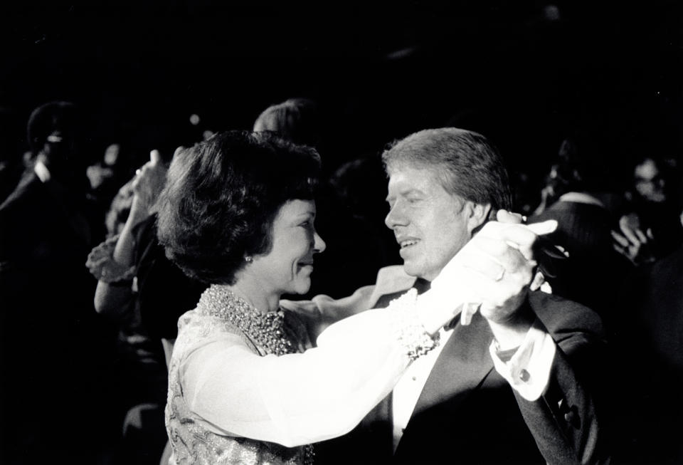 President Jimmy Carter and First Lady Rosalynn Carter dance among their guests at their inaugural ball in 1977. - Credit: White House Historical Association