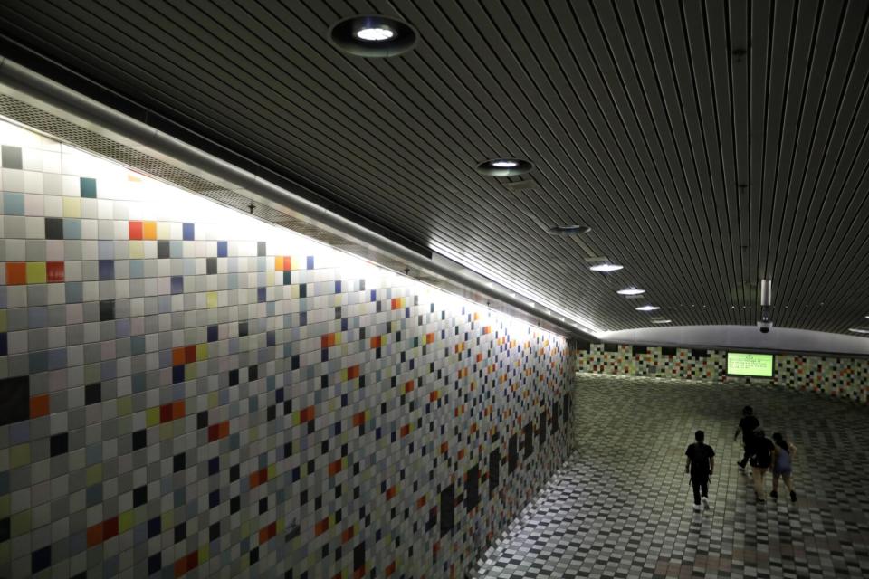 Commuters at the Hollywood and Western Metro station in Hollywood