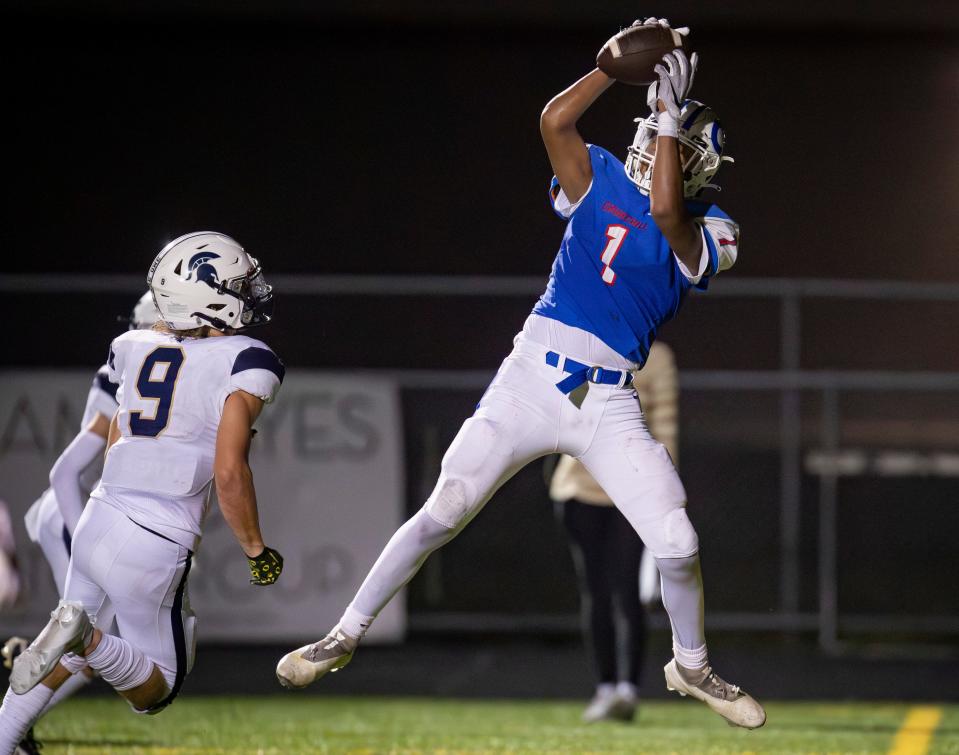 Churchill’s Donovan Jackson hauls in a pass on a two-point conversion in the second half as the Marist Spartans defeated the Churchill Lancers 36-35 in overtime Friday, Sept. 1, 2023, at Churchill High School in Eugene.