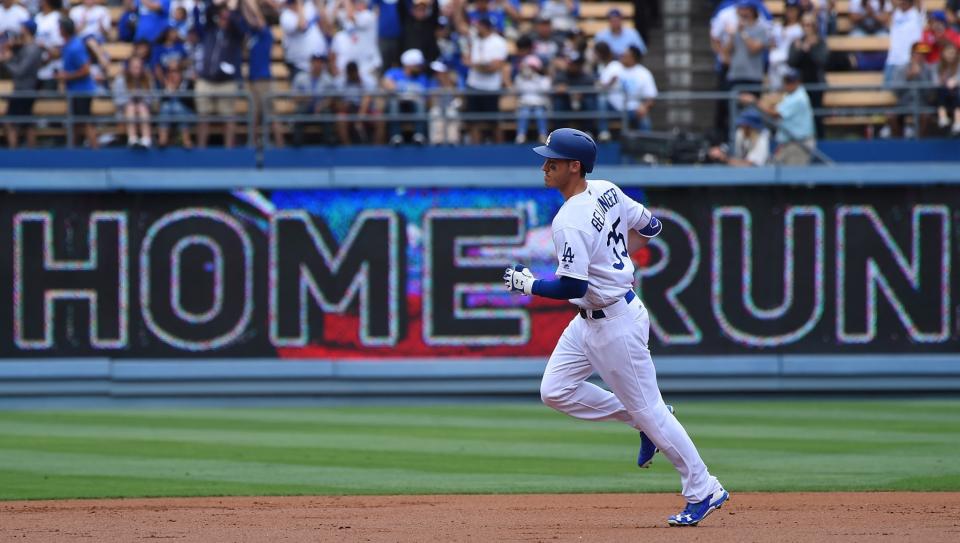 Cody Bellinger rounds the bases after a home run. 