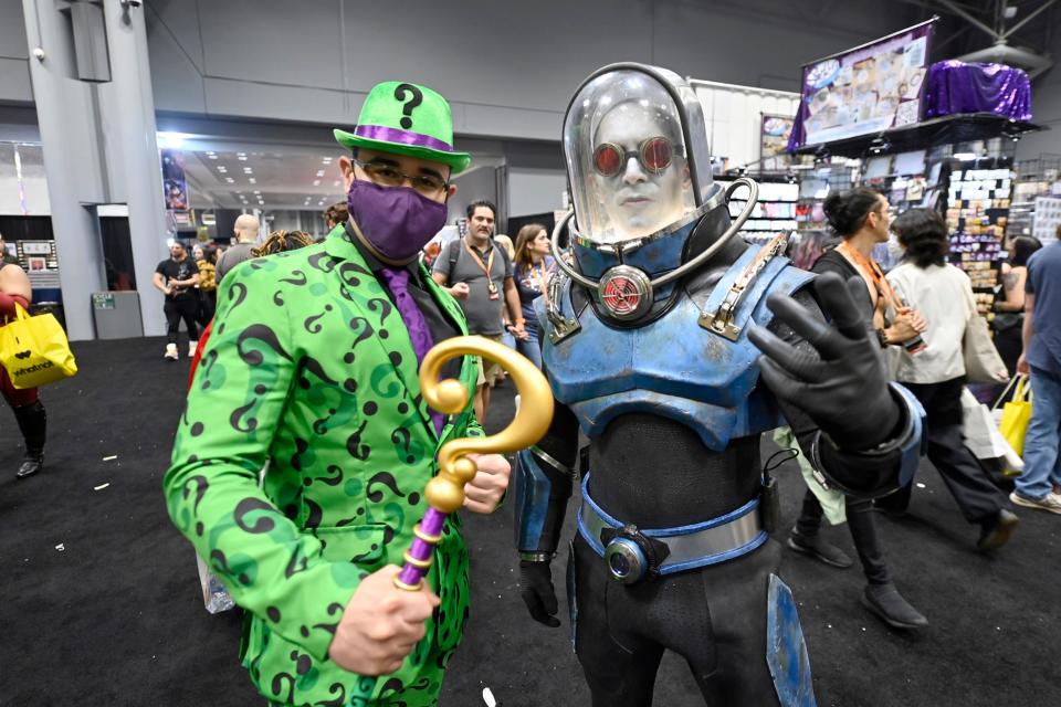Cosplayers dressed as The Riddler and Mr. Freeze at New York Comic Con 2022.