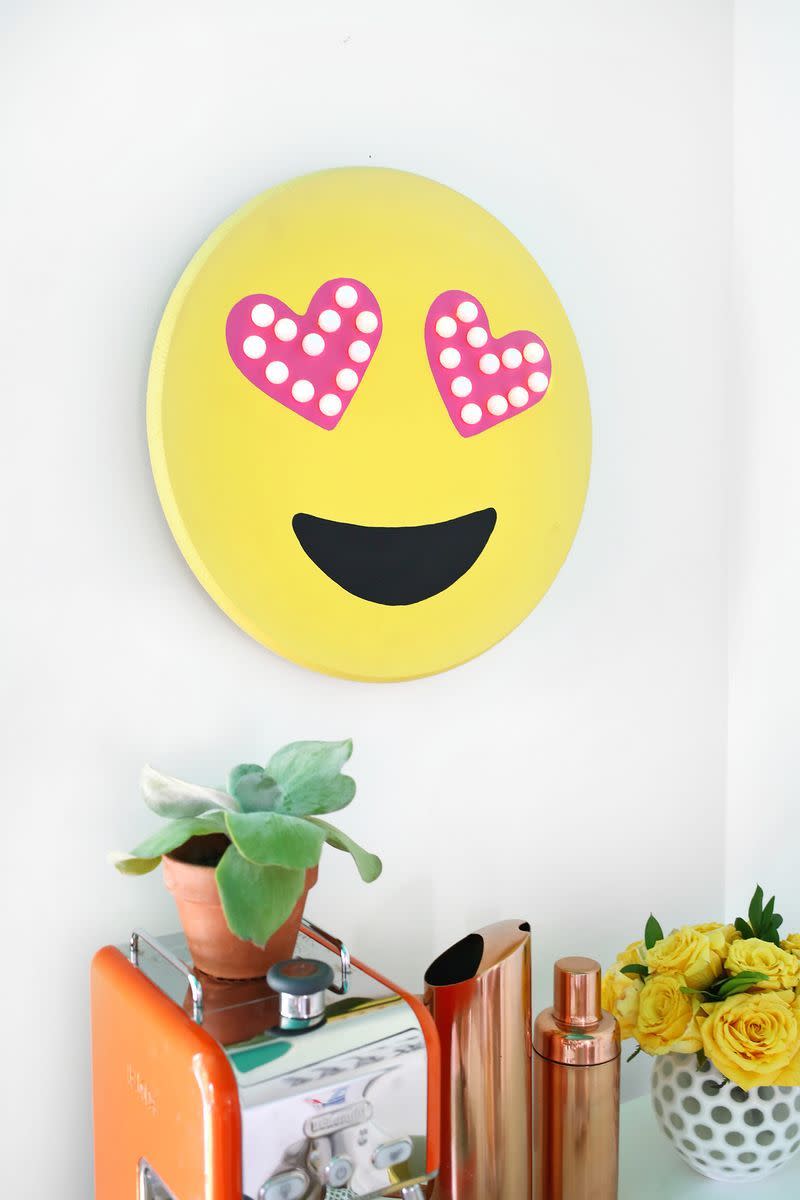 <p>Emoji Marquee Sign</p><p>Your heart eyes will light up too after you see this decorative addition hanging on your office wall. (Source: <a href="http://www.abeautifulmess.com/2015/05/diy-emoji-marquee-.html" rel="nofollow noopener" target="_blank" data-ylk="slk:A Beautiful Mess;elm:context_link;itc:0;sec:content-canvas" class="link ">A Beautiful Mess</a>)</p>