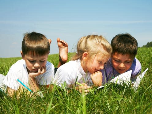 <span class="caption">Simply taking lessons outside can do wonders for children's education and well-being.</span> <span class="attribution"><a class="link " href="https://www.shutterstock.com/image-photo/schoolchildren-painting-something-exercise-books-outdoor-100149350?src=QdKSUq5y4Ds2f-wz0nPEAA-1-6" rel="nofollow noopener" target="_blank" data-ylk="slk:legenda/Shutterstock;elm:context_link;itc:0;sec:content-canvas">legenda/Shutterstock</a></span>