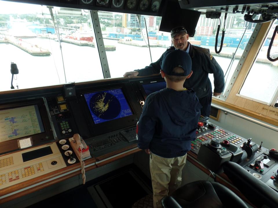 Crew members of the ship Captain Molly Kool gave groups of people a tour inside, from the captain's chair to the corridors below sea level.